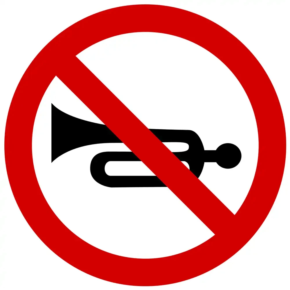 Znak drogowy B-29 - zakaz używania sygnałów dźwiękowych - folia II generacji.webp