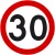 Znak drogowy B-33 ograniczenie prędkości do 30 km/h, średnica 400 mm, folia II generacji. Okrągły znak zakazu z czerwoną obwódką i czarną liczbą 30 na białym tle. Produkt do bezpiecznego oznaczania terenu budowy, dróg osiedlowych i stref zamieszkania
