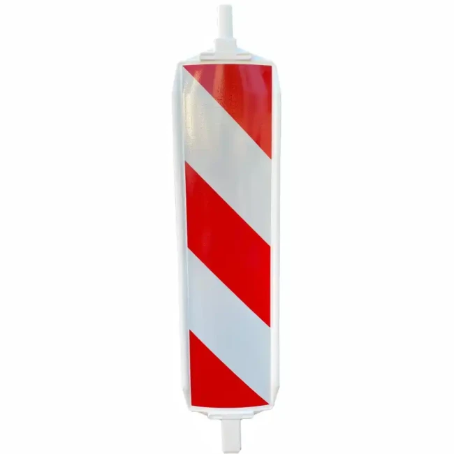Drogowa tablica kierująca U-21 a/b wykonana ze wzmocnionego PCV z biało-czerwonymi pasami. Odblaskowa folia I generacji zapewnia widoczność. Profesjonalny separator ruchu do oznakowania robót drogowych i zwężeń.